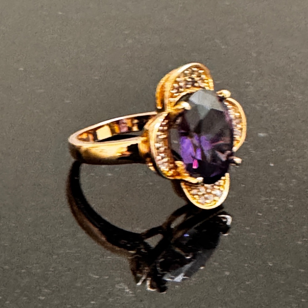 Gold-Tone Ring with Purple Oval Gemstone and Pavé Accents